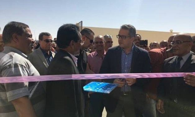 Minister of Antiquities opening the newly built storage facility (Photo courtesy to Ministry of Antiquities)