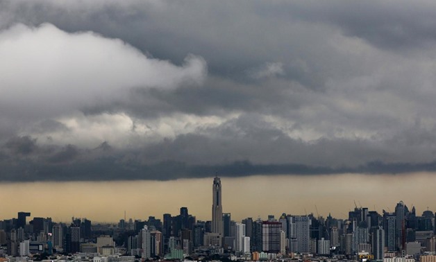 Rain clouds gather over central Bangkok, Thailand, October 2, 2017. REUTERS/Athit Perawongmetha