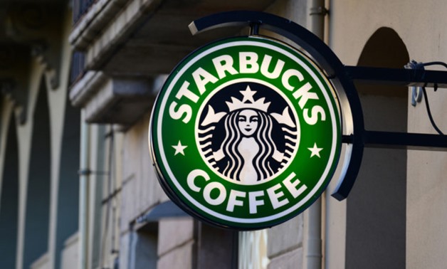 AFP/File | Starbucks is bucking a trend by shutting down its online store

