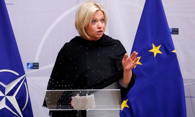  Dutch Defence Minister Jeanine Hennis-Plasschaert delivers a speech before signing european military cooperation agreements at the Alliance headquarters in Brussels, Belgium - REUTERS