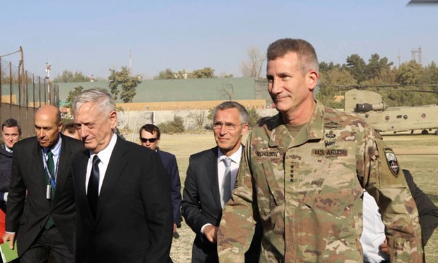 U.S. Defense Secretary James Mattis and NATO Secretary Seneral Jens Stoltenberg (C) are welcomed by U.S. general John Nicholson after arriving at Resolute Support Mission headquarters in Kabul - REUTERS