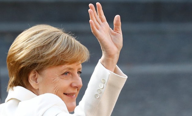 German Chancellor Angela Merkel waves during German Unification Day celebrations in Mainz, Germany, October 3, 2017. REUTERS