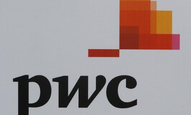 The logo of accounting firm PricewaterhouseCoopers (PwC) is seen on a board at the St. Petersburg International Economic Forum 2017 (SPIEF 2017) in St. Petersburg, Russia, June 1, 2017. REUTERS/Sergei Karpukhin