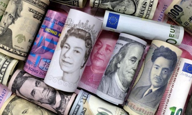 Euro, Hong Kong dollar, U.S. dollar, Japanese yen, pound and Chinese 100 yuan banknotes are seen in this picture illustration, January 21, 2016. REUTERS/Jason Lee/Illustration