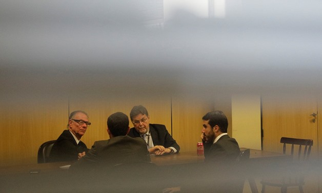 Brazilian Olympic Committee President Nuzman talks with his lawyers before his hearing at the Federal Police headquarters in Rio de Janeiro – Press image courtesy file photo