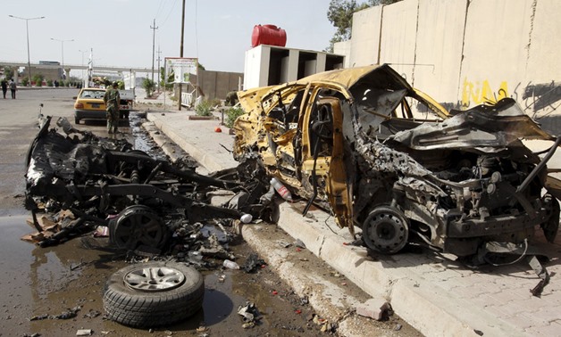 The remains of the car that exploded in the Saydiya district of southern Baghdad, Iraq May 2, 2016. © Khalid al Mousily / Reuters