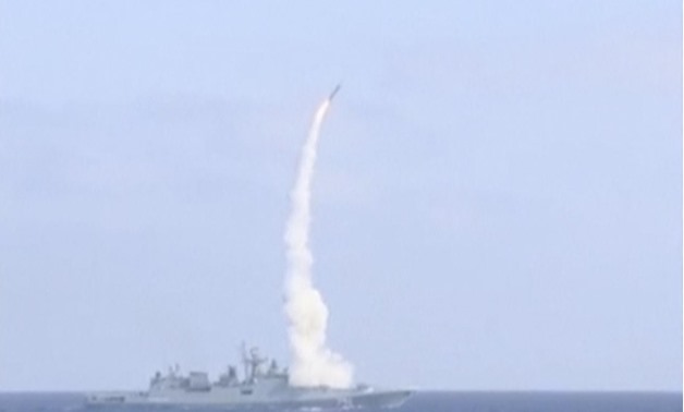 A still image taken from a video footage and released by Russia's Defence Ministry on September 5, 2017, shows the Russian frigate Admiral Essen in the Mediterranean Sea firing a Kalibr cruise missile at Islamic State targets near the Syrian city of Deir 