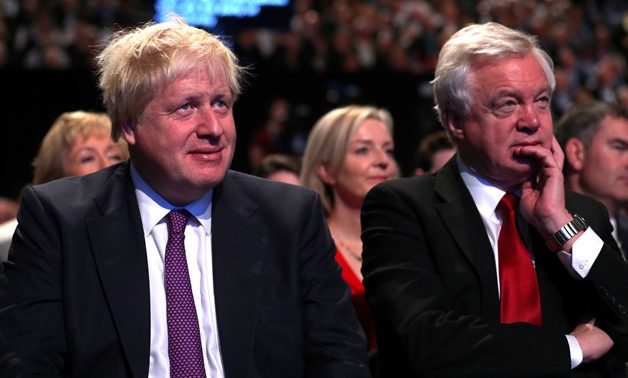 Britain's Foreign Secretary Boris Johnson and Secretary of State for Exiting the European Union David Davis at the Conservative Party conference in Manchester, October 4, 2017. REUTERS/Hannah McKay