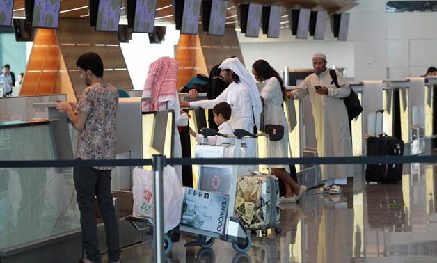 Passengers stand at Hamad International Airport in Doha, Qatar, June 7, 2017.Reuters-Naseem Zeitoon