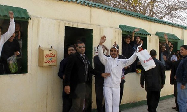 File- Egyptian prisoners celebrate their release- press photo