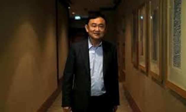  Former Thai Prime Minister Thaksin Shinawatra leaves after an interview with Reuters in Singapore February 23, 2016. REUTERS/Edgar Su/File Photo