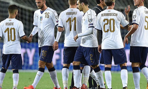 Italy's players leave the pitch at the end of their World Cup qualifying match against Macedonia -AFP