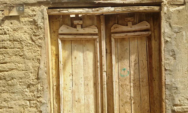 The simple wooden door of late president Anwar Sadat home
