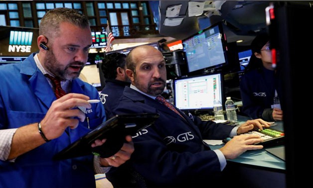 Traders work on the floor of the New York Stock Exchange (NYSE) in New York, U.S., October 3, 2017 -
 REUTERS/Brendan McDermid