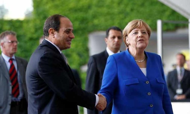 German Chancellor Angela Merkel meets Egypt's President Abdel-Fattah el-Sisi at the Chancellery in Berlin- reuters