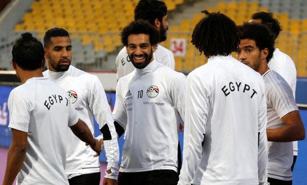  2018 World Cup Qualifications - Africa - Egypt Training - Borg El Arab Stadium, Alexandria, Egypt - October 7, 2017 - Egypt's Mohamed Salah smiles next to his teammates. REUTERS/Amr Abdallah Dalsh