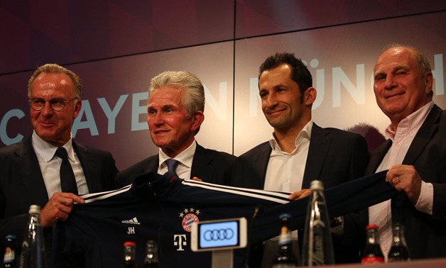 Jupp Heynckes with Bayern Munich`s board - Reuters