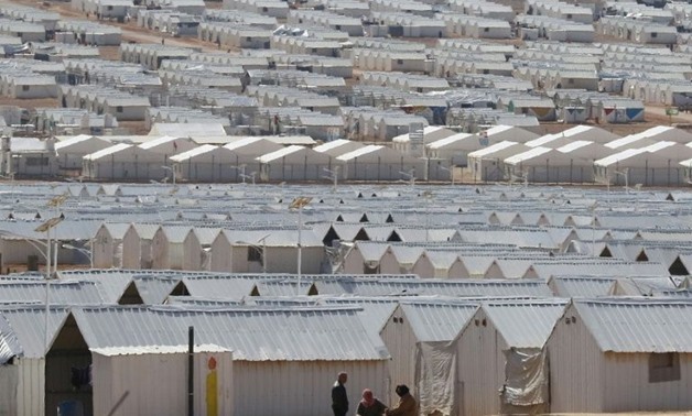 Prefabricated metal homes stretch into the distance at the Azraq camp for Syrian refugees in northern Jordan - AFP