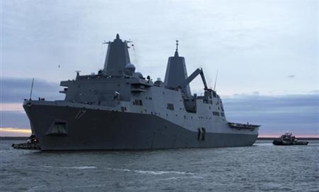 The amphibious transport dock ship USS San Antonio (LPD 17) departs Naval Station Norfolk in Norfolk, Virginia October 31, 2012 in this handout photo supplied by the U.S. Navy November 1, 2012. REUTERS