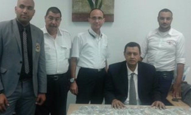 senior officials at Borg el Arab International Airport, headed by Samir Seddeq Fatahullah, a General Director of airports - File Photo