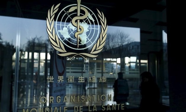 People arrive at World Health Organization headquarters in Geneva, Switzerland, January 25, 2016. REUTERS/Denis Balibouse