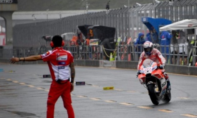  AFP- Ducati rider Andrea Dovizioso set the early pace in wet conditions