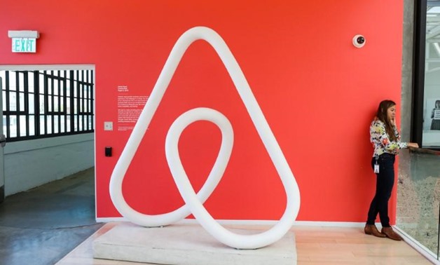  A woman talks on the phone at the Airbnb office headquarters in the SOMA district of San Francisco, California, U.S., REUTERS - Gabrielle Lurie
