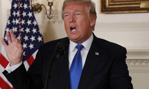 US President Donald Trump speaks about the Iran nuclear deal in the Diplomatic Room of the White House in Washington.-Reuters
