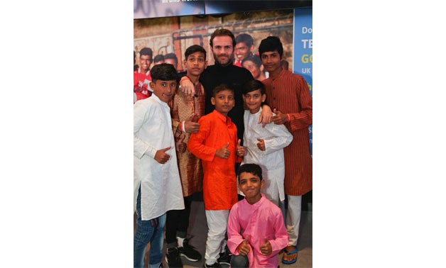 Juan Mata with Indian children, Juan Mata official Facebook page 