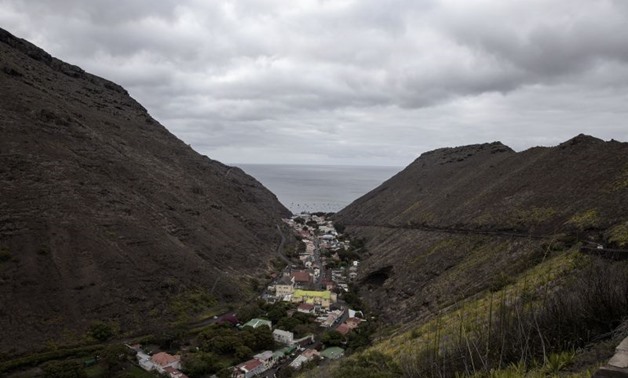A picture taken on October 14, 2017 shows a general view of Saint Helena's capitol Jamestown on the day of the first inaugural commercial plane from Johannesburg in the volcanic tropical island of Saint Helena, in the South Atlantic Ocean and part of the 