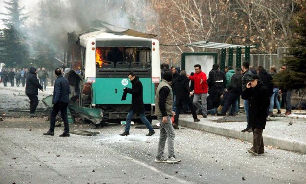 People react after a bus was hit by an explosion in Kayseri, Turkey, December 17, 2016. Turan Bulut/ Ihlas News Agency via REUTERS
