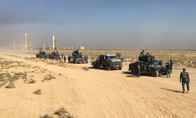 Members of Iraqi federal forces enter oil fields in Kirkuk, Iraq October 16, 2017. REUTERS/Stringer