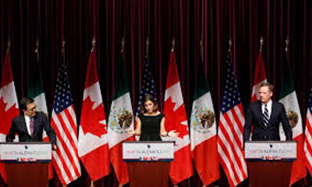 Canada's Foreign Minister Chrystia Freeland (C) addresses the media with Mexico's Economy Minister Ildefonso Guajardo (L) and U.S. Trade Representative Robert Lighthizer at the close of the third round of NAFTA talks involving the United States, Mexico an