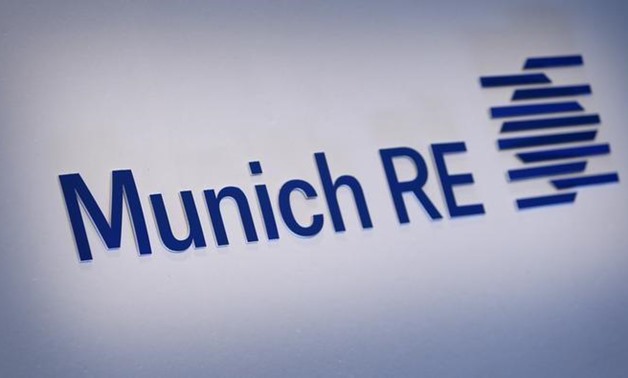 Company logo of German Reinsurer Munich Re is pictured prior the company's annual news conference in Munich March 11, 2015. REUTERS/Michaela Rehle