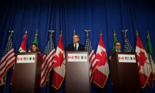 US Trade Representative Robert Lighthizer (C), Canadian Foreign Minister Chrystia Freeland (L), and Mexican Finance Minister Ildefonso Guajardo Villarreal addressed the media at the end of the fourth round of talks on renegotiating NAFTA