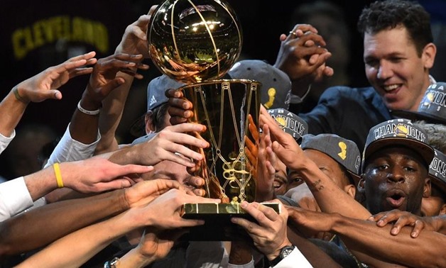 Golden State Warriors` players celebrating the title, NBA Official website