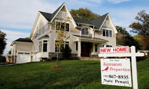 A real estate sign advertising a new home for sale is pictured in Vienna, Virginia, U.S. October 20, 2014 -
 REUTERS/Larry Downing/File Photo