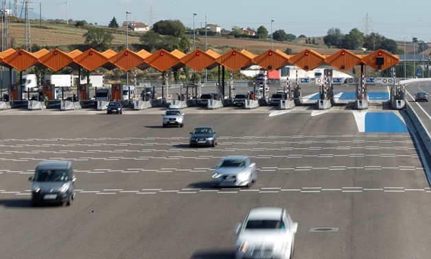 Toll booths are seen on a toll road operated by Abertis near Barcelona -- REUTERS