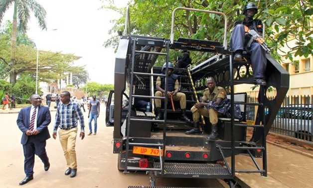 Ugandan anti terrorist police deployed at the entrance of the parliament ahead of proposed age limit amendment bill debate by lawmakers -- REUTERS
