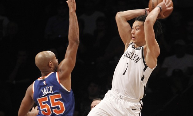 Brooklyn Nets guard Jeremy Lin (7) passes the ball against New York Knicks guard Jarrett Jack (55) – Press image courtesy Reuters