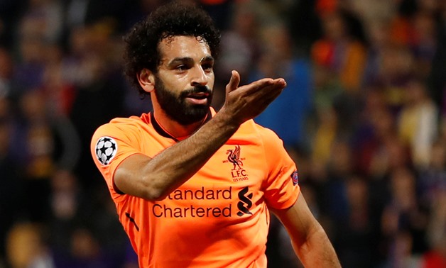 Liverpool's Mohamed Salah celebrates scoring team’s third goal – Action Images via Reuters