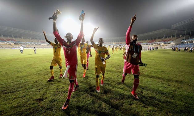 Players of Mali celebrate after qualifying for quarter-finals, FIFA