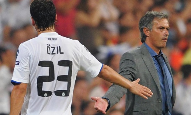 Jose Mourinho and Mesut Özil worked together for three years at Real Madrid – REUTERS