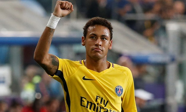 Paris Saint Germain’s Neymar celebrates scoring their third goal REUTERS