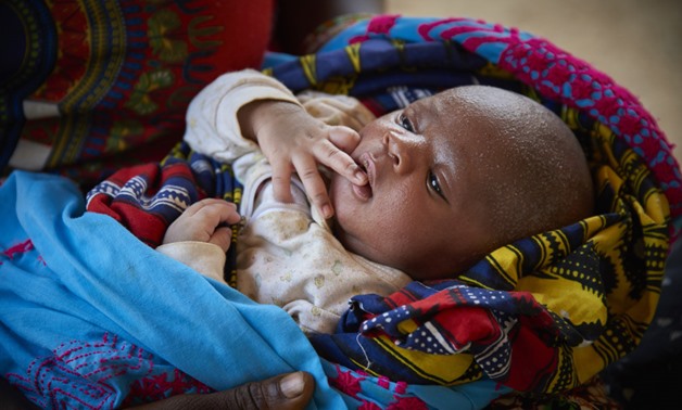 A Nine Day Old Baby Boy From Sierra Leone - Photo Credit UNICEF - Phelps