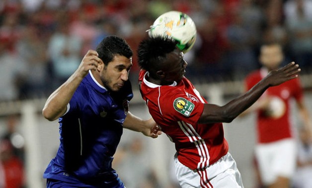 Etoile Sportive du Sahel's Alkhaly Bangoura in action with Ramy Rabia of Al Ahly - REUTERS