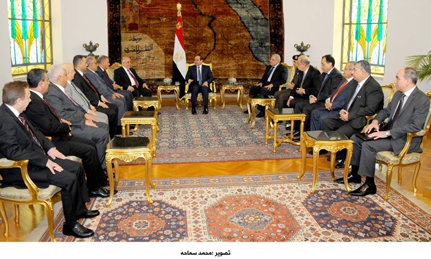 President Sisi (C) meets with Iraqi Prime Minister Haider al-Abadi at Cairo-based presidential office - photo courtesy of the Egyptian Presidency/ File photo