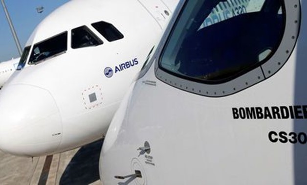 An Airbus A320neo aircraft and a Bombardier CSeries aircraft are pictured during a news conference to announce a partnership between Airbus and Bombardier on the C Series aircraft programme, in Colomiers near Toulouse, France, October 17, 2017. Picture ta