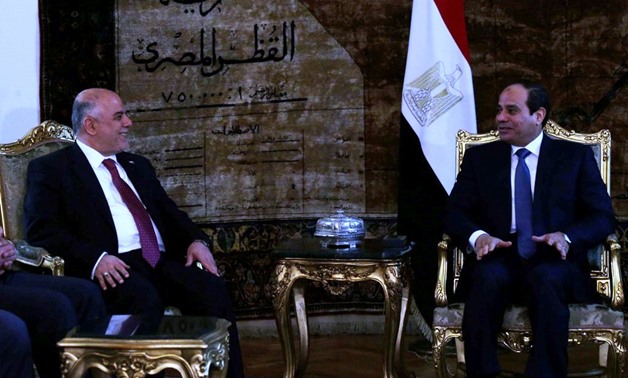 Abdel Fatah Al-Sisi (R), Haidar Abadi (L)