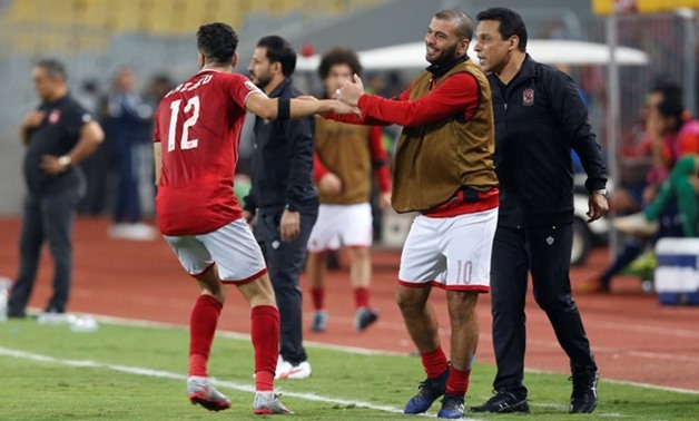 Al-Ahly's Walid Azaro celebrates with Emad Moteab and coach Hossam el-Badry after scoring a goal - REUTERS-Amr Dalsh